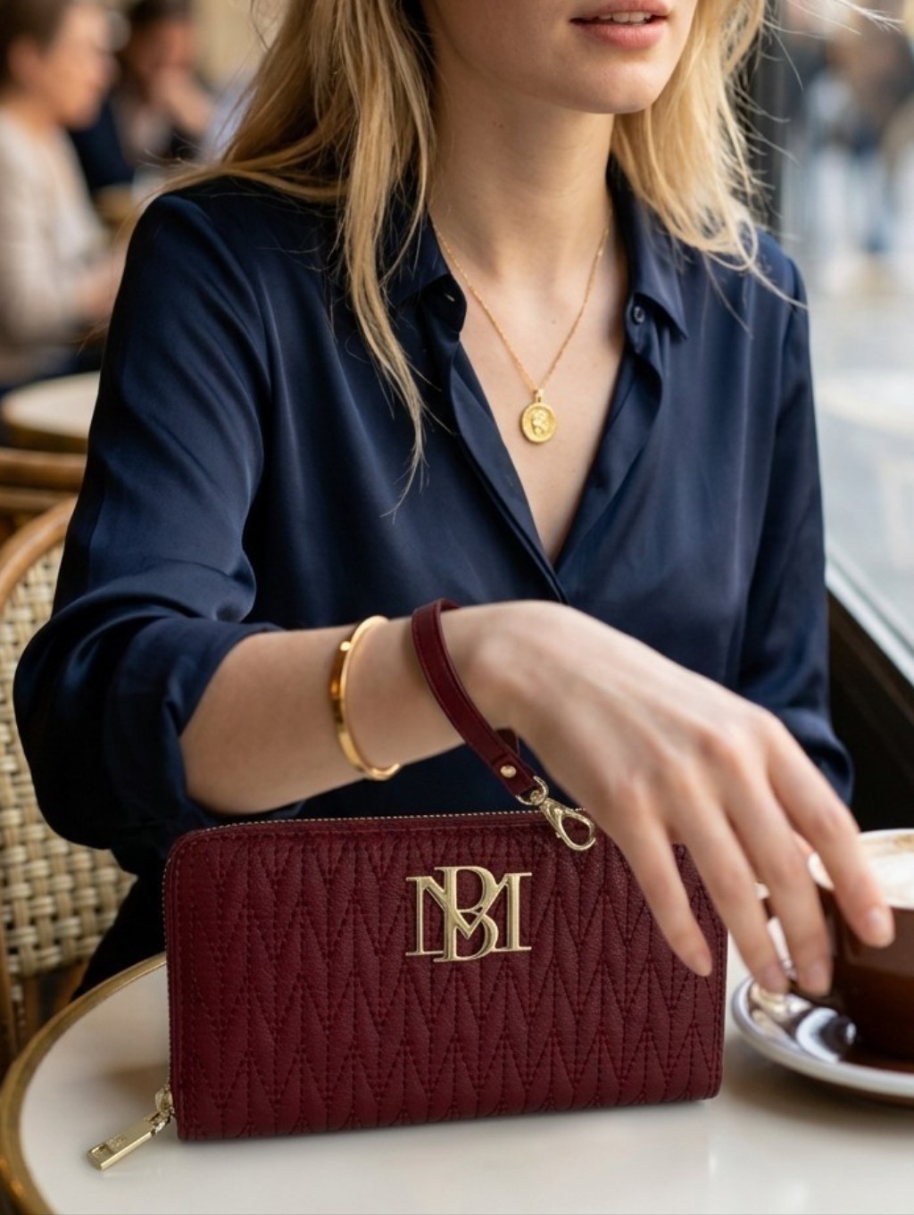 #209 Badgley Mischka Quilted Burgundy Wristlet With Gold Logo